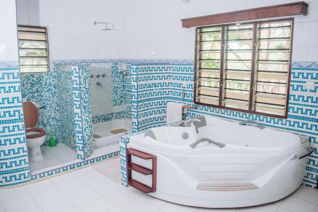 Kijani Cottages Diani Diani Beach Bagian luar foto